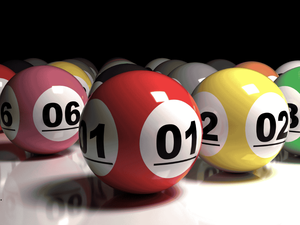 En la imagen se ven unas balotas de juego de lotería